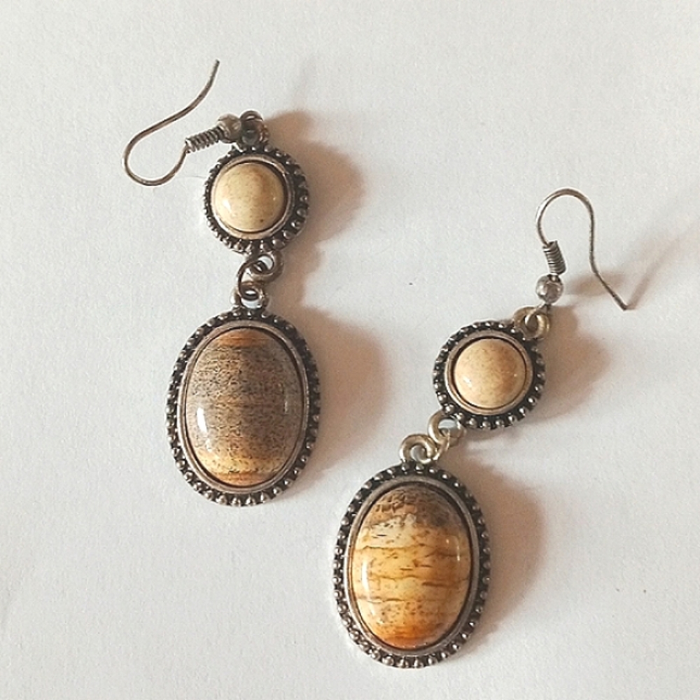 Silver dangle earrings with stones
